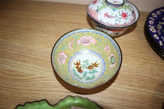 A Chinese Canton enamel brushwasher, two bowls and cover, four plates and three stands, 19th/20th century